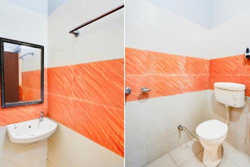 two pictures of a bathroom with a toilet and a sink at Hotel O Dehradun City Centre in Dehradun