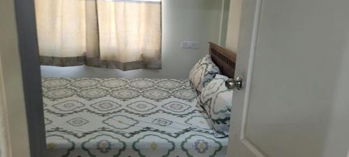 Ένα ή περισσότερα κρεβάτια σε δωμάτιο στο Elegant beach view flat