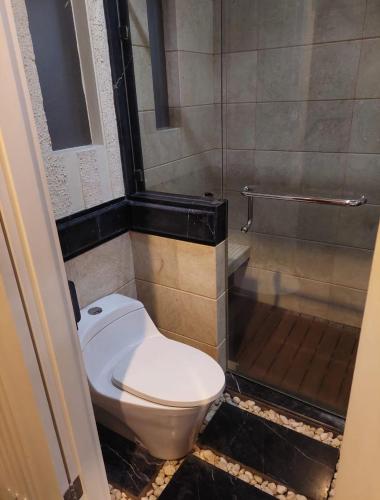 Ένα μπάνιο στο Guest House Sentul by Benchmark