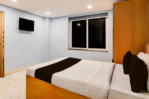 Postel nebo postele na pokoji v ubytování Super Townhouse Lighthouse Beach Sea View