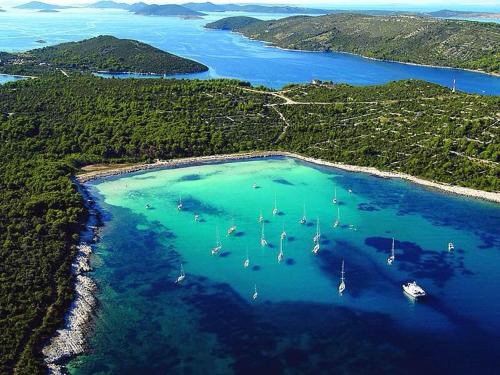 an aerial view of a harbor with boats in the water at Apartments The heart of Croatia in Pirovac