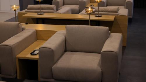 a living room with a couch and a table at Workers Hotel Daejeon by Aank in Daejeon