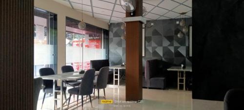 Zona de estar de Hotel Simla