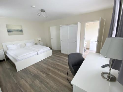 REGIOHOTEL Naturresort Ilsenburgにあるベッド