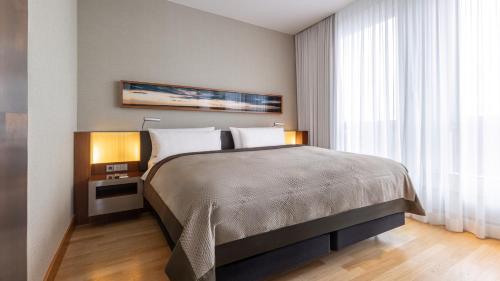 Postel nebo postele na pokoji v ubytování InterContinental Berlin by IHG