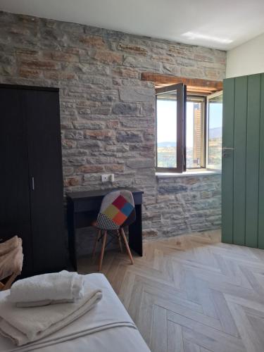 Кровать или кровати в номере Bellevia Stone Pool Villa