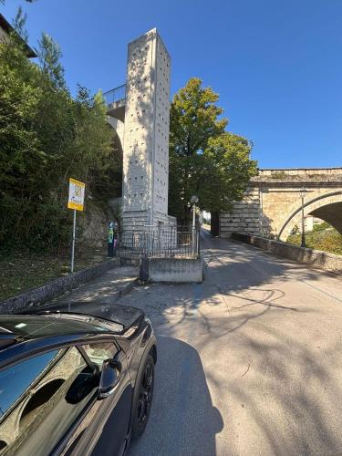 a car parked on a road next to a bridge at Casa di in Ascoli Piceno