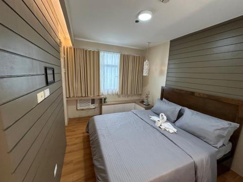 Katil atau katil-katil dalam bilik di Urban Stay in Seawind 1BR with Flexi