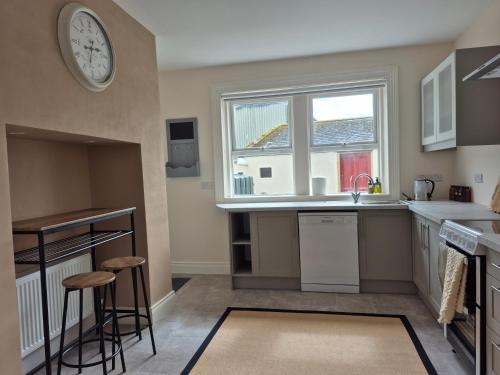 a kitchen with a sink and a window at En-suite room Cloughjordan 4 in Cloghjordan