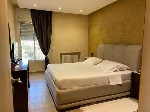 Una cama o camas en una habitación de Dar Misk
