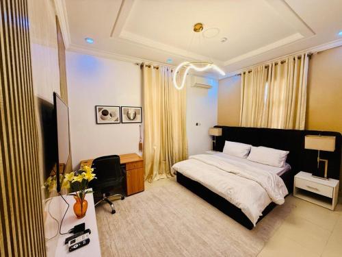 Ένα ή περισσότερα κρεβάτια σε δωμάτιο στο Tee and Tee 4 Bedroom Apartment, Victoria Island, Lagos, Nigeria