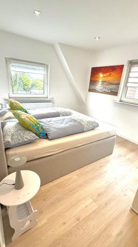 a bedroom with a bed and a table at Dreamily charming apartment 
