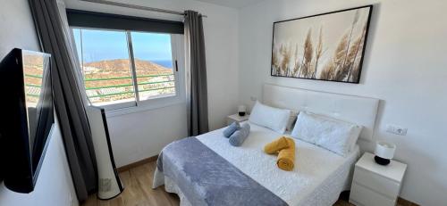 Postel nebo postele na pokoji v ubytování Apartamento Vista Atlántico Puerto Rico