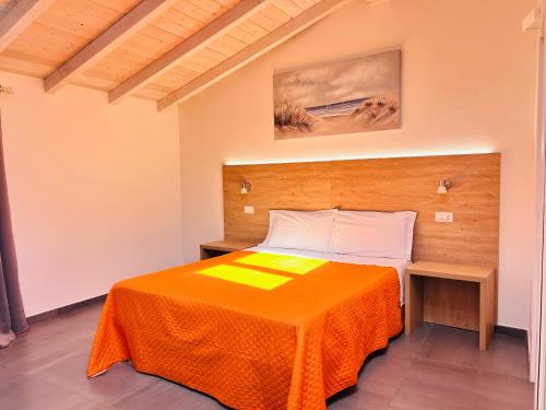 Postel nebo postele na pokoji v ubytování Longevity Hotel