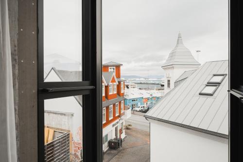 a view from a window of a city at Exeter Hotel in Reykjavík