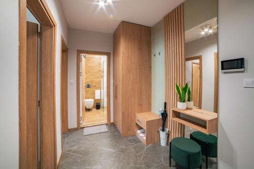 a bathroom with a sink and a toilet in a room at TRINAVIS Boutique Apartments, OWN PRIVATE PARKING, City Center, Entire Apartment in Veliko Tŭrnovo