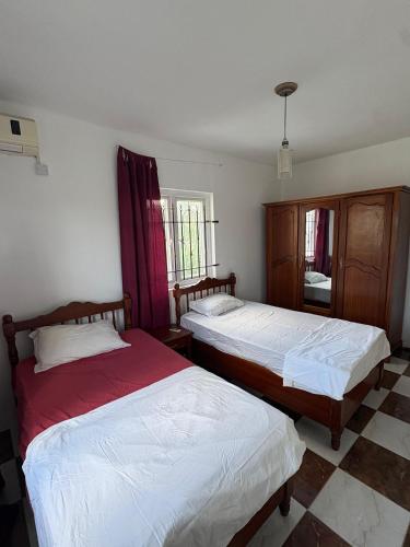 Ένα ή περισσότερα κρεβάτια σε δωμάτιο στο Villa Blue Calodyne