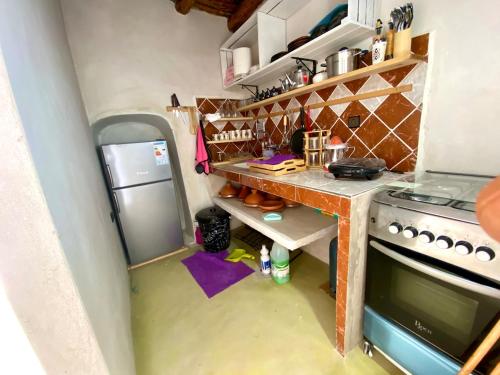 Kuchyň nebo kuchyňský kout v ubytování King Room with Shared Bathroom