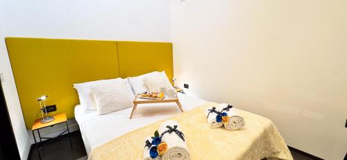Ένα ή περισσότερα κρεβάτια σε δωμάτιο στο Tema apartment by Ca-Sa Check