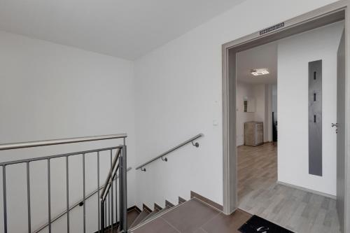 グラーフェンヴェーアにある3-Bedroom Apartment with Garden Near US Army Gate 1のギャラリーの写真