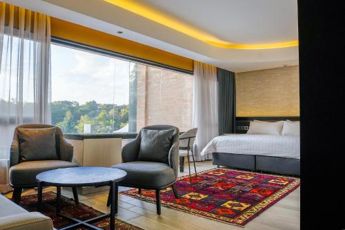 Una cama o camas en una habitación de Tribe Hotel, Nairobi, a Member of Design Hotels