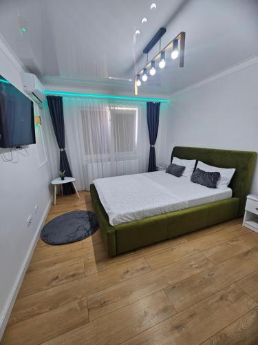 Postel nebo postele na pokoji v ubytování Modern & Glam Studio Costi