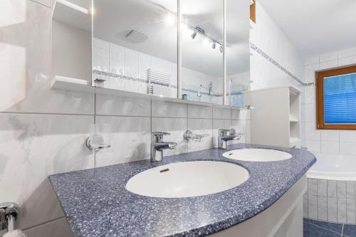 Una cocina o cocineta en Apart Jil-Marie