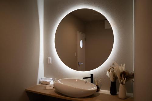 Un baño de 糸島絶景サウナスイートヴィラ & ペットフレンドリー