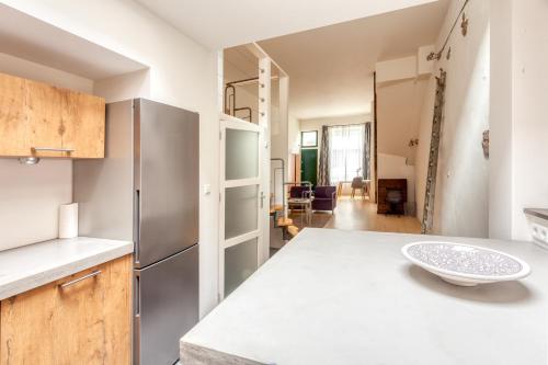 Η κουζίνα ή μικρή κουζίνα στο Voldersgracht Canal Home Haarlem