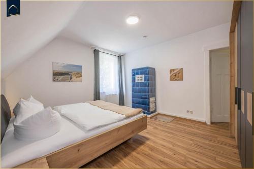 Postel nebo postele na pokoji v ubytování Ferienhaus Oscar