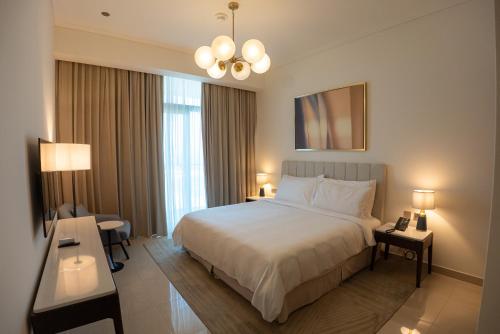 Address Beach Resort Residence Bahrainにあるベッド