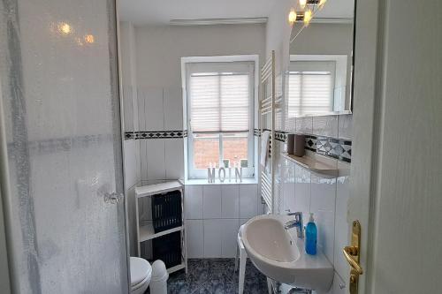 Ένα μπάνιο στο Ferienwohnung Austernfischer Dagebüll