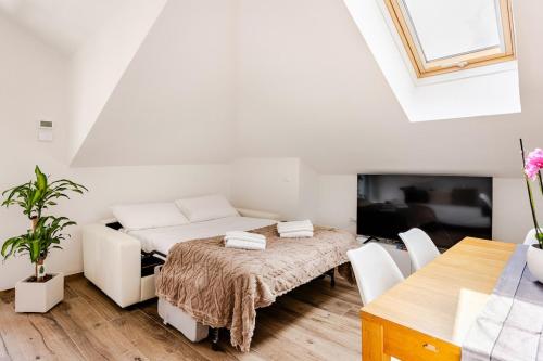 Letto o letti in una camera di Chalet Moderno Aprica - vicino alle piste e parcheggio incluso
