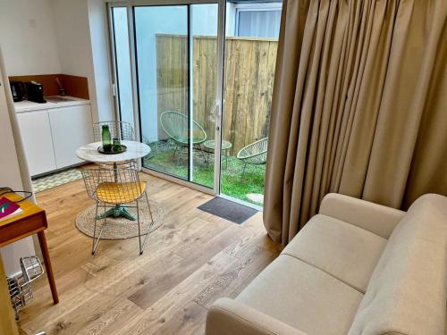 Χώρος καθιστικού στο Chez Camille - Boutique Aparthotel au coeur de Bordeaux
