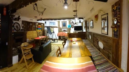 a living room with a couch and a table at Ferienhaus-Römerthurm in Schöder