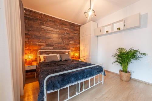 Postel nebo postele na pokoji v ubytování Omului 21 Apartment