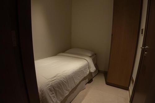 Address Beach Resort Residence Bahrainにあるベッド