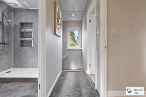 a bathroom with a shower and a walk in shower at Rosie's Central House With Drive Parking in Nottingham