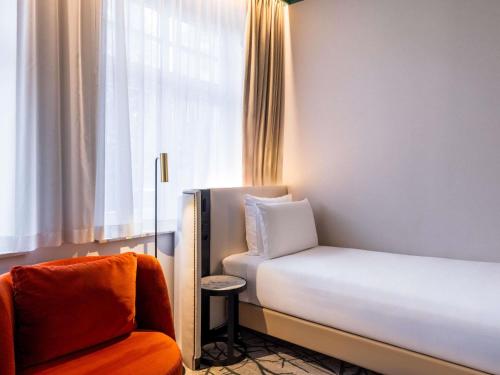 Кровать или кровати в номере Rezydent Hotel Sopot - MGallery Collection