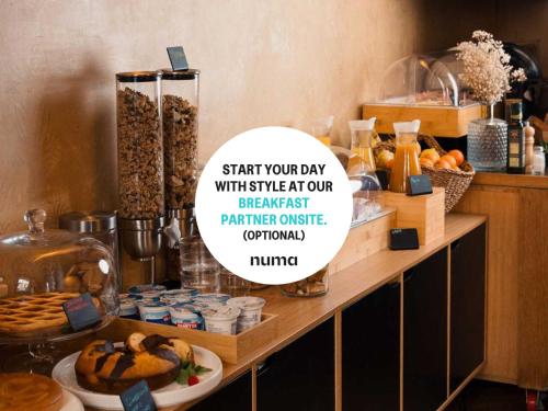 a sign that says start your day with refrigerator breakfast and mixed at Numa Florence Rodo in Florence