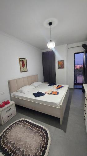 เตียงในห้องที่ Esi's Apartment