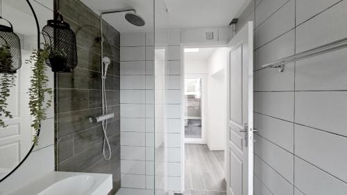 a bathroom with a shower and a sink at Loft Mons Centre 5 in Mons