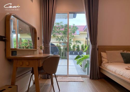 Postel nebo postele na pokoji v ubytování C8 Rock Garden Pool Villa พูลวิลล่า