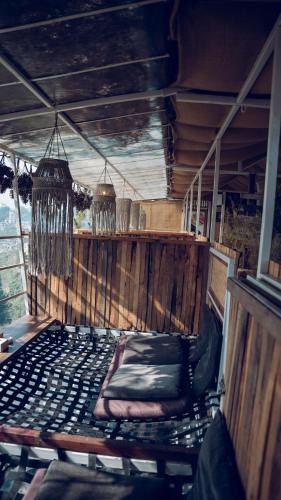 a bed on the back of a boat at Windy Hill Hotel And Restaurant in Bungmati