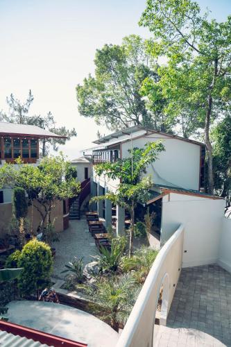 an external view of a house with a courtyard at Windy Hill Hotel And Restaurant in Bungmati