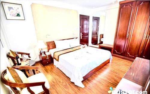 Ένα ή περισσότερα κρεβάτια σε δωμάτιο στο ORANGE Hotel & Suites - Danang City CENTER, near Dragon Bridge