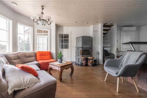 Гостиная зона в Karkutahko Villas 2 - Comfy 3BR Villa in Tahko with Private Sauna