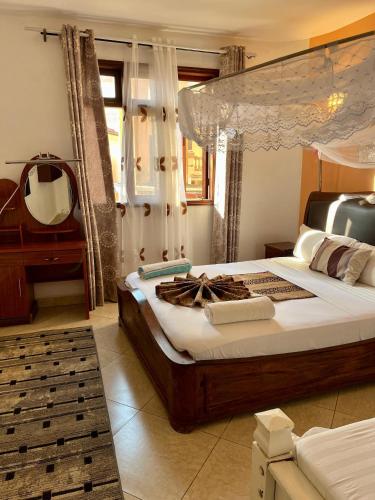 Katil atau katil-katil dalam bilik di Coastal bliss apartment