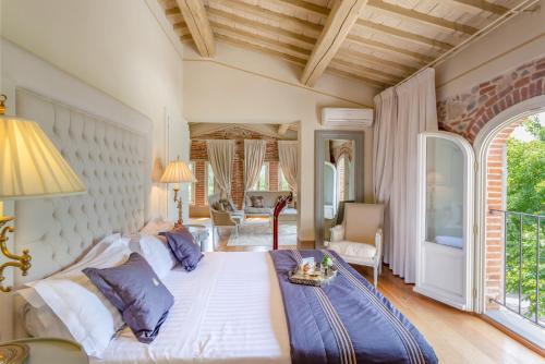 Ένα ή περισσότερα κρεβάτια σε δωμάτιο στο florence luxury residence