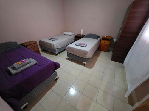 Cama o camas de una habitación en MGC Fiambala